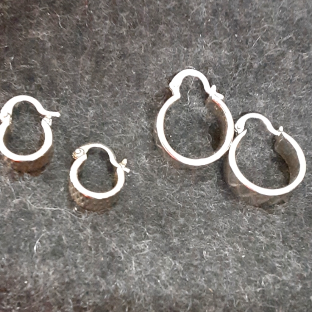 Small hoop earrings, 2pair, silver tone,beautiful diamond cuts adding shimmer.